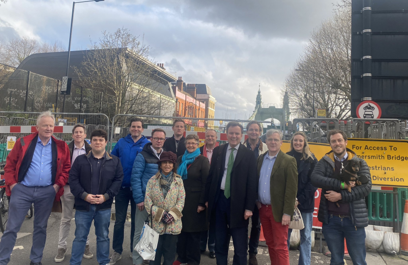 Greg Hands and local campaigners at Hammersmith Bridge 